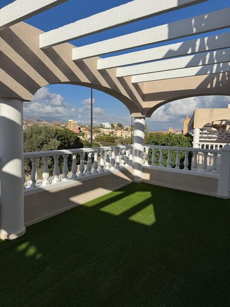 Foto abb9cd9c-0d7d-433f-ae7a-5e65bbff98b6. Casa adossada amb aparcament piscina a Pueblo Acantilado-Lanuza Campello (el)