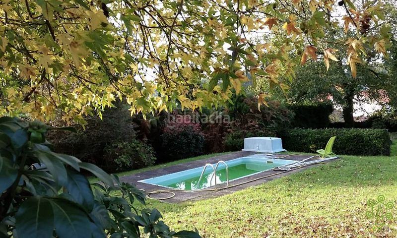 Foto 86a3ed12-c1d3-45b0-b0d6-ff0a5ceb5047. Casa amb xemeneia calefacció aparcament piscina a Abegondo