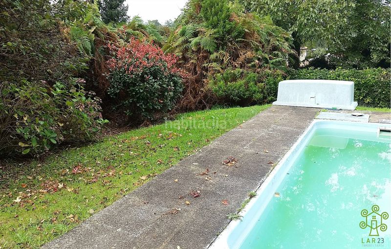 Foto f41c76be-4b32-4297-8472-18d90a6ce65d. Casa amb xemeneia calefacció aparcament piscina a Abegondo