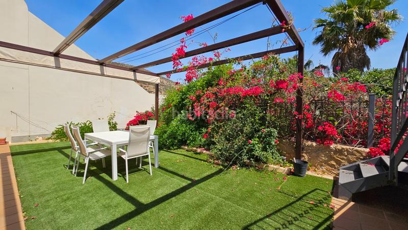 Foto 20d5e1de-cf3f-4542-b178-1596b1f0aaaf. Casa aparellada amb calefacció aparcament piscina a Cartagena