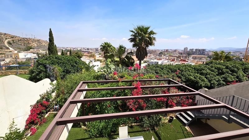 Foto 52d8f403-4dd3-457f-a5f9-d3078bf87d73. Casa aparellada amb calefacció aparcament piscina a Cartagena