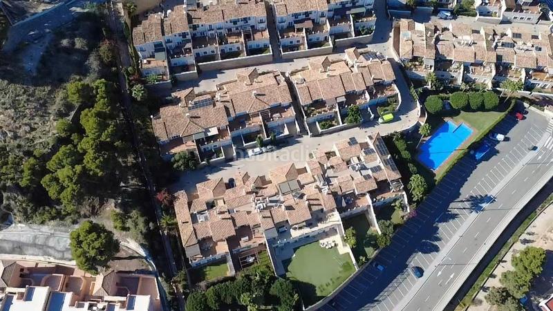 Foto b35f6f84-924b-4cc0-bd3d-2093d37f0cfa. Casa aparellada amb calefacció aparcament piscina a Cartagena