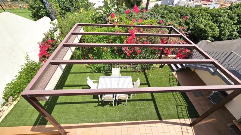 Foto f8b69eda-5791-427d-9a16-a90194524e4c. Casa aparellada amb calefacció aparcament piscina a Cartagena