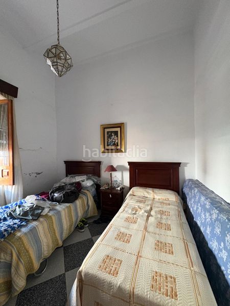 Foto c6916f82-9400-4fc4-b2dd-4fa7e229fc26. Casa aparellada a Carmona