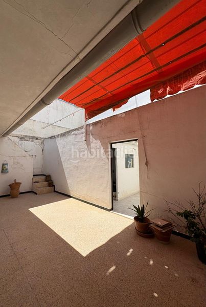 Foto c7de7569-60a9-4f12-81c3-000af4eccde7. Casa aparellada a Carmona