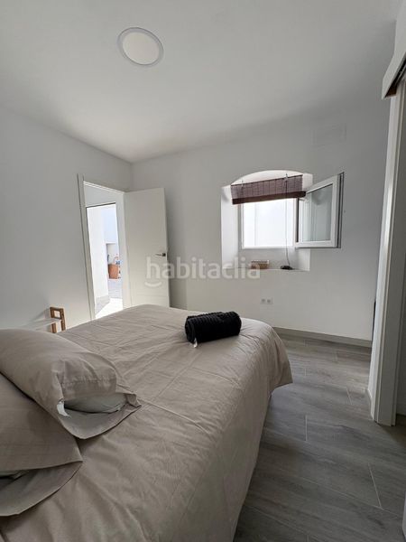 Foto 8e54fc47-c174-42f6-9d2a-5f9fbf6bab2e. Casa aparellada a Carmona