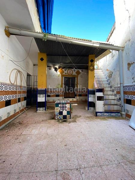 Foto cf0dec98-eff3-49f4-89ef-384fb899df8b. Casa adossada a Carmona