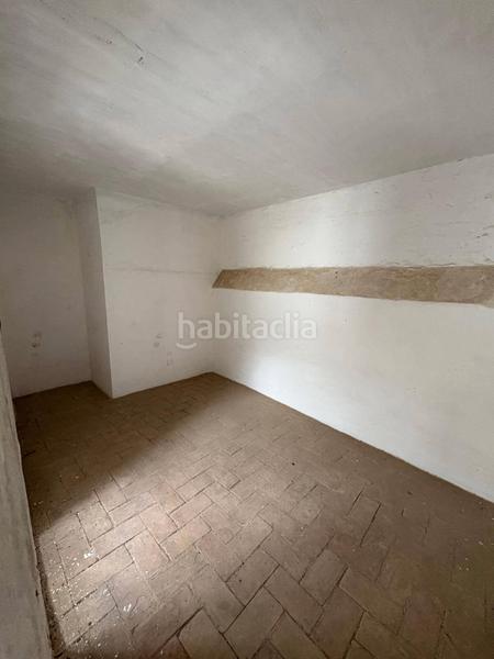 Foto eeeb18a3-e62d-469a-825f-fb4008930261. Casa adossada a Carmona