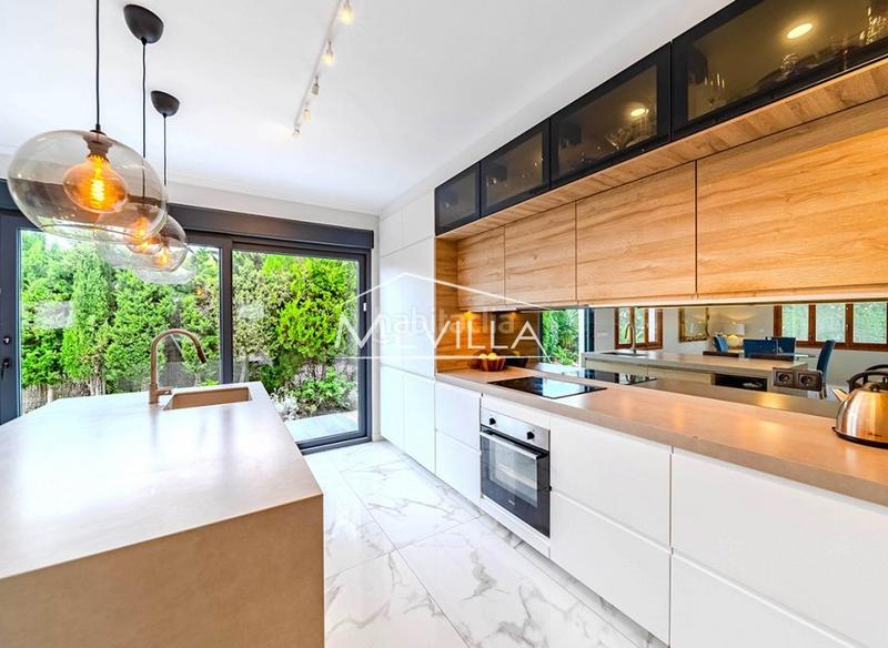 Foto 4ba58a04-2b24-4a90-959d-911dc985943a. Maison avec parking piscine dans Campoamor Orihuela