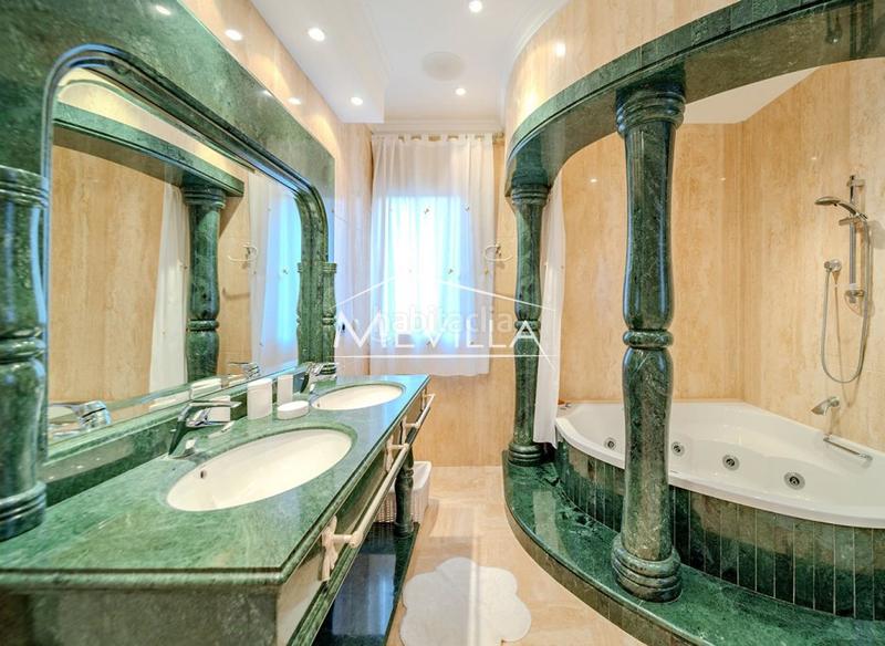 Foto 040b64ed-5ebc-43b5-9a35-c87679943ecc. House with parking pool in Campoamor Orihuela