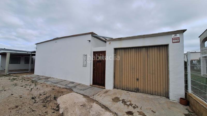 Foto 530e1e0e-a89a-46f0-bd7d-d48a60d75713. Casa amb aparcament a Oliva nova Oliva