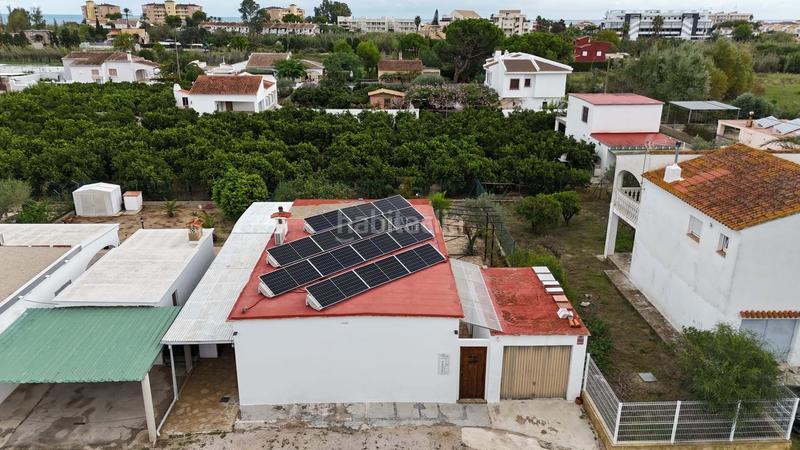 Foto 96b3add9-34d8-46e8-831e-6b1806170b30. Casa amb aparcament a Oliva nova Oliva