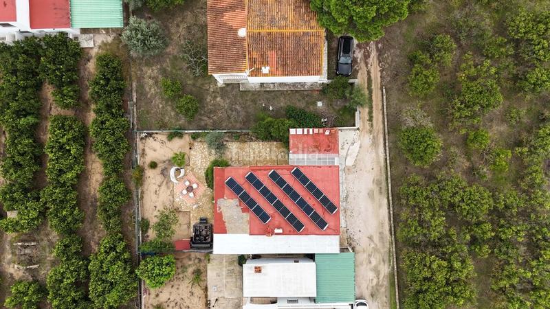 Foto b4d209ca-25d1-4492-9c02-b60269225661. Casa amb aparcament a Oliva nova Oliva