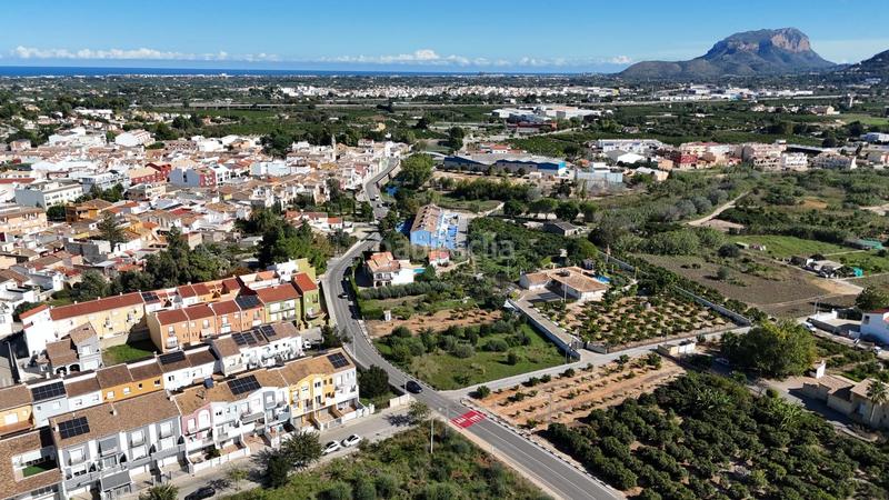 Foto 2f74241a-883b-47df-a3f9-3fbf92d238c7. Casa adossada amb calefacció aparcament a Beniarbeig