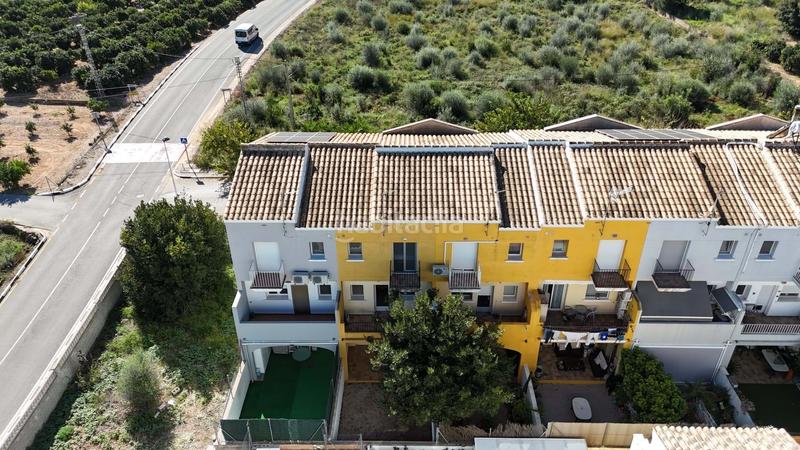 Foto 5ec7b46f-5033-497f-ae4e-f3ba8600dce8. Casa adossada amb calefacció aparcament a Beniarbeig