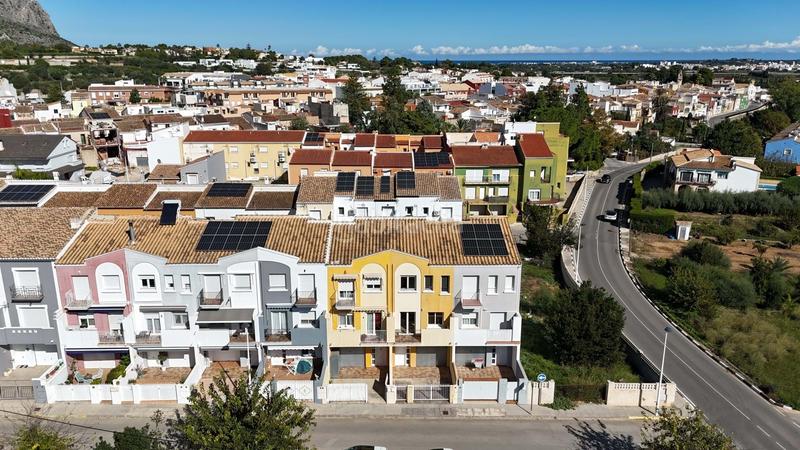 Foto bb60ed5c-c4d3-43f2-8d7f-243af6636969. Casa adossada amb calefacció aparcament a Beniarbeig