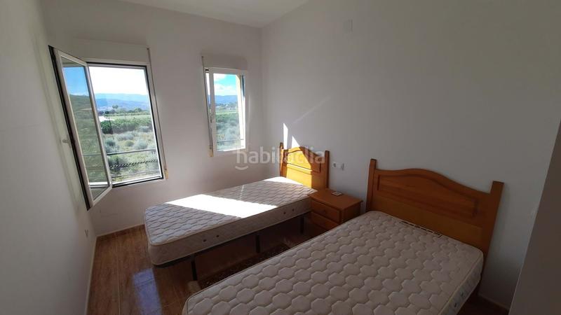 Foto bbcf45a2-d5a0-4b75-95ed-b9f3a2a1e62f. Casa adossada amb calefacció aparcament a Beniarbeig