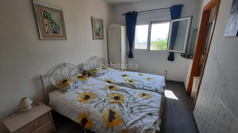 Foto 411821d6-ff09-466c-845a-498f7b4192c3. Casa adosada la propiedad cuenta con un diseño luminoso de planta abierta en la planta baja, que combina una cocina moderna, un cómodo salón y en Nucia (la)