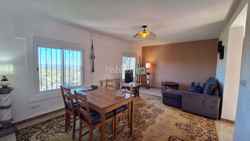 Foto ba8f06fe-6ca1-4632-b0db-f03f6fc6bf35. Casa amb calefacció a Benidoleig