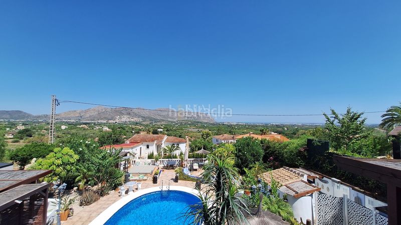 Foto 3838f5d9-cdc2-49cf-b338-7122bc577c0c. Casa amb piscina a Benidoleig