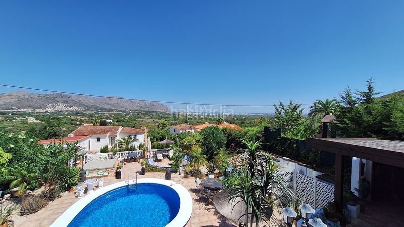 Foto 7308bf98-61d7-48d8-910f-c2f33e63b323. Casa amb piscina a Benidoleig