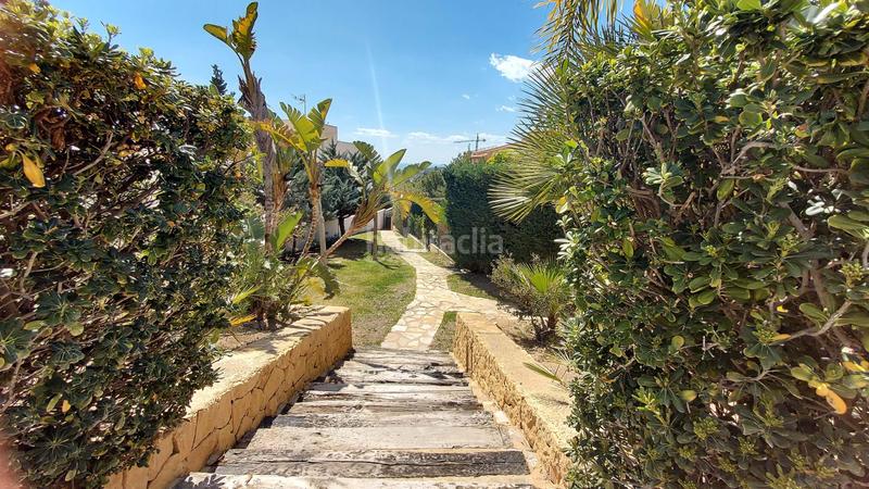 Foto 5a05277d-8fc0-4172-a68b-9fba0467fc0c. Casa adossada amb calefacció piscina a Golf Bahía Finestrat