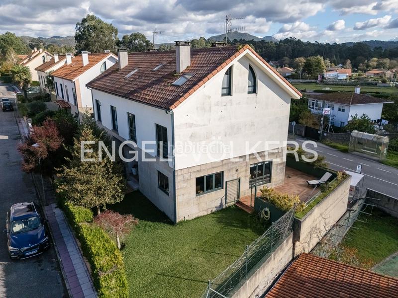 Foto 8f44fb1f-f403-464e-bbda-f0d1aaceda2d. Semi detached house with heating parking in Nigrán centro Nigrán