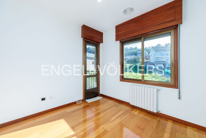 Foto ea070abb-d7b8-4be0-a212-f965e89383a6. Casa amb calefacció aparcament a Bembrive Vigo