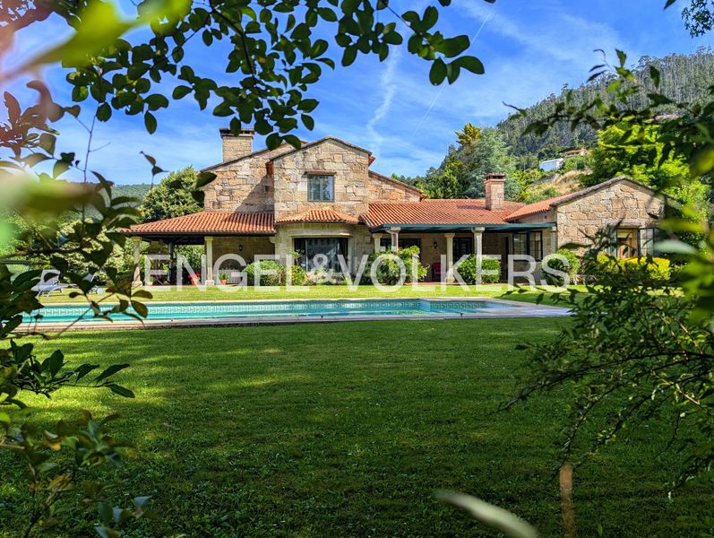Foto 790041ad-5ad8-4be5-93e9-653d8bf75744. Casa amb calefacció aparcament piscina a Camos Nigrán