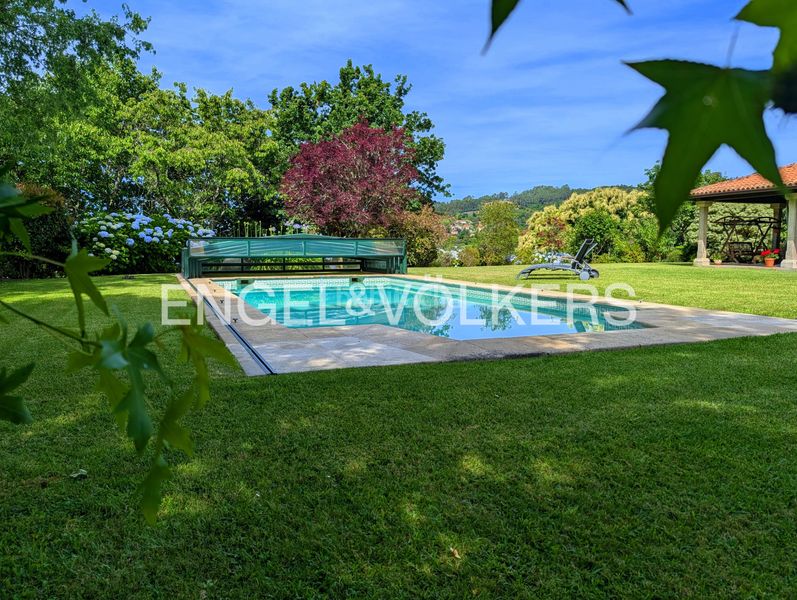 Foto bc694a84-244c-49ba-9152-c2fa96e738ac. Casa amb calefacció aparcament piscina a Camos Nigrán
