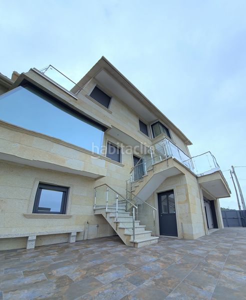 Foto b6bdcbd7-a034-4339-b0f4-9db722567a53. Casa amb calefacció aparcament a Coruxo - Oia - Saiáns Vigo