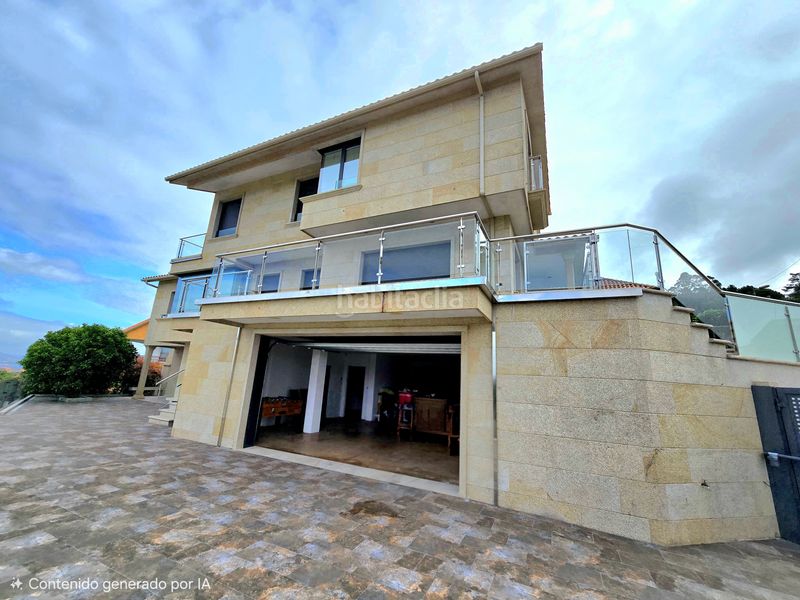 Foto e626ad0c-09fa-436f-a2cc-fab984cc63ee. Casa amb calefacció aparcament a Coruxo - Oia - Saiáns Vigo