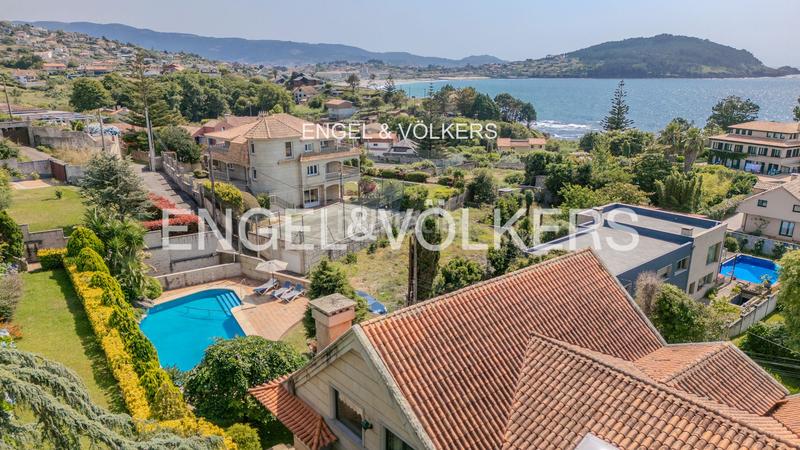 Foto a4d89dc4-76b7-46f2-bb0d-f5e11d8962f1. Casa amb calefacció aparcament piscina a Coruxo - Oia - Saiáns Vigo