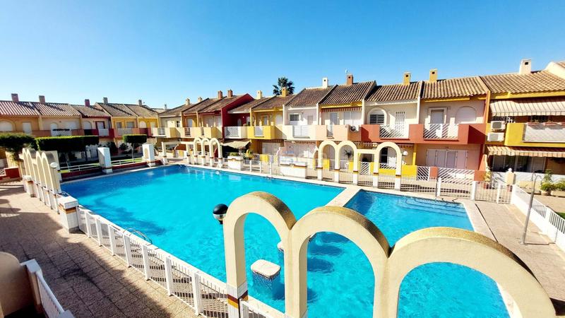 Foto 384e5a6f-9b6b-45fb-91ba-57c7a0d692b6. Casa a schiera con parcheggio piscina in Santiago de La Ribera San Javier