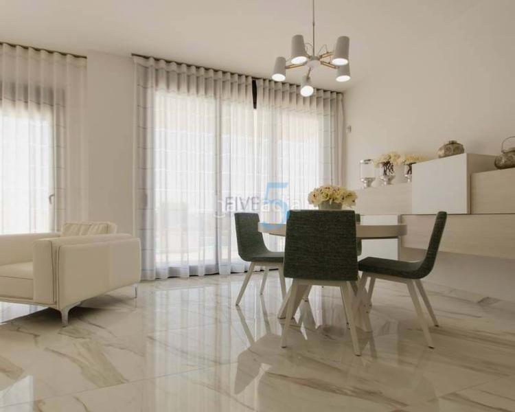 Foto 9a831e7a-cb8f-4eed-b1af-aeae1c32e340. Maison dans Campoamor Orihuela