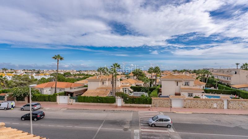 Foto 1e4b41b4-a7cb-4fe2-b8a9-3305e3de64b9. Casa adossada amb piscina a Playa Flamenca Orihuela