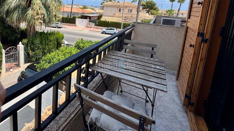 Foto 292de20b-8e95-4b23-870a-3dcd4a37111b. Casa adossada amb piscina a Playa Flamenca Orihuela