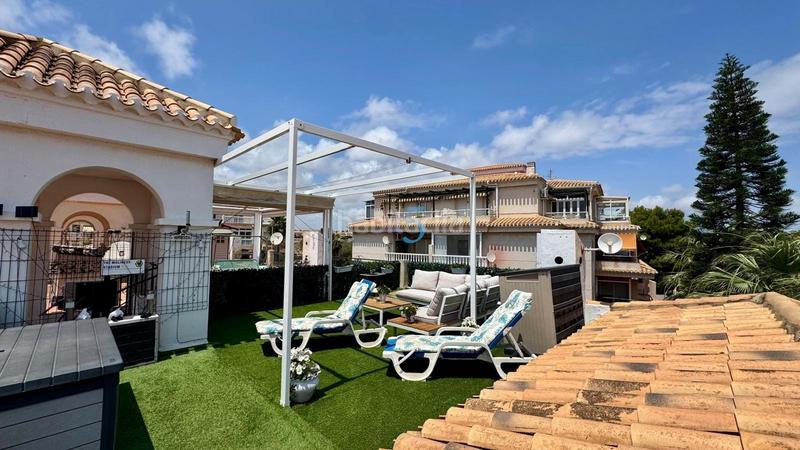 Foto 82461ecd-192d-44a8-8c6a-36a5fef49e53. Casa adossada amb piscina a Playa Flamenca Orihuela
