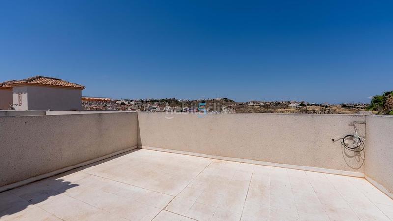 Foto fbb362f1-ffec-4996-bbe0-b30b35d142ff. Casa adossada amb piscina a Rojales