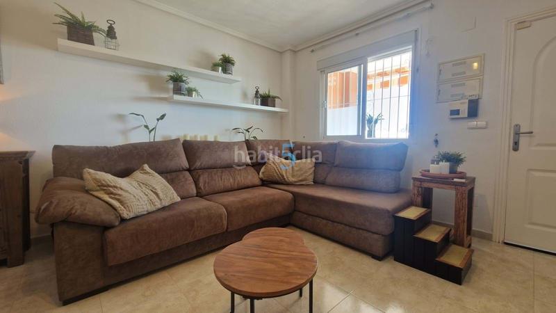 Foto eebca1cc-77f2-48f8-b10f-b36f7c9a67ac. Casa adossada amb calefacció piscina a Rojales