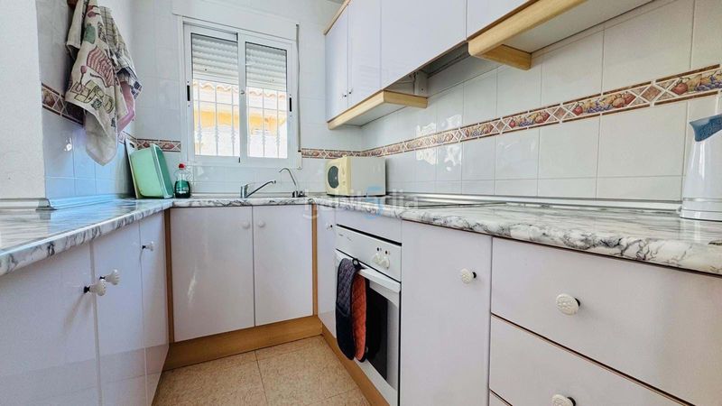 Foto a32f2da1-d9c0-40ca-ae9b-2e81c41d58e3. Reihenhaus mit pool in Villamartín-Las Filipinas Orihuela