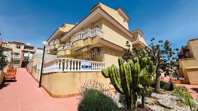 Foto ab3b137f-8e89-4f28-bbfb-ee957ecedcf7. Reihenhaus mit pool in Villamartín-Las Filipinas Orihuela