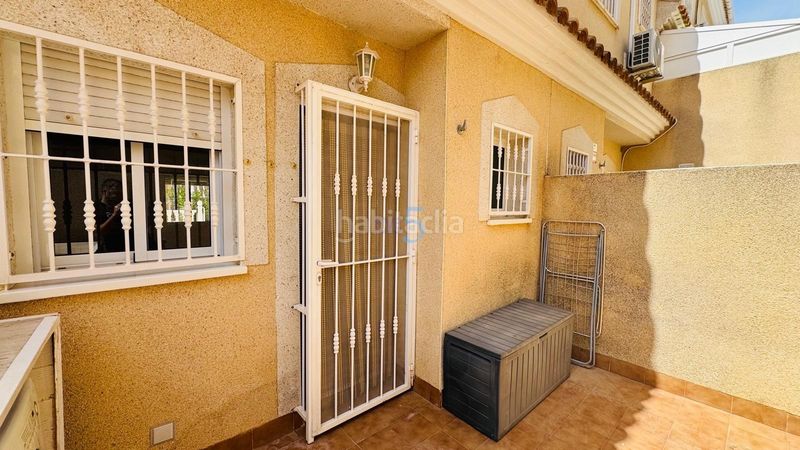 Foto ac693c3a-e783-4a1a-8846-05fc4bbb0174. Reihenhaus mit pool in Villamartín-Las Filipinas Orihuela