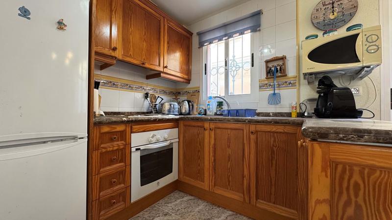 Foto e18162e8-e574-43f7-918e-55869f03836f. Reihenhaus mit pool in Villamartín-Las Filipinas Orihuela