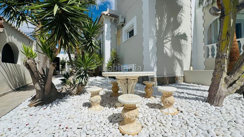 Foto f970cc26-bcd2-4d00-a73f-34dde06e47dd. Casa amb piscina a Playa Flamenca Orihuela