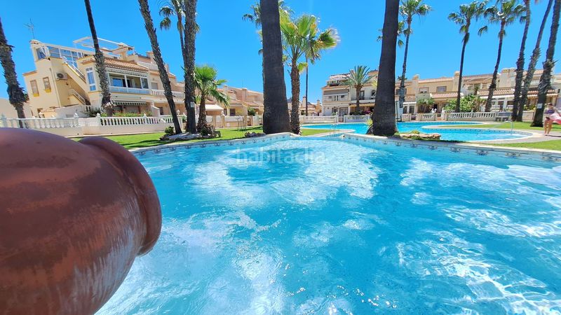 Foto 66a7191b-b3a0-44af-8128-37d38e9dff5d. Casa amb aparcament piscina a Playa Flamenca Orihuela