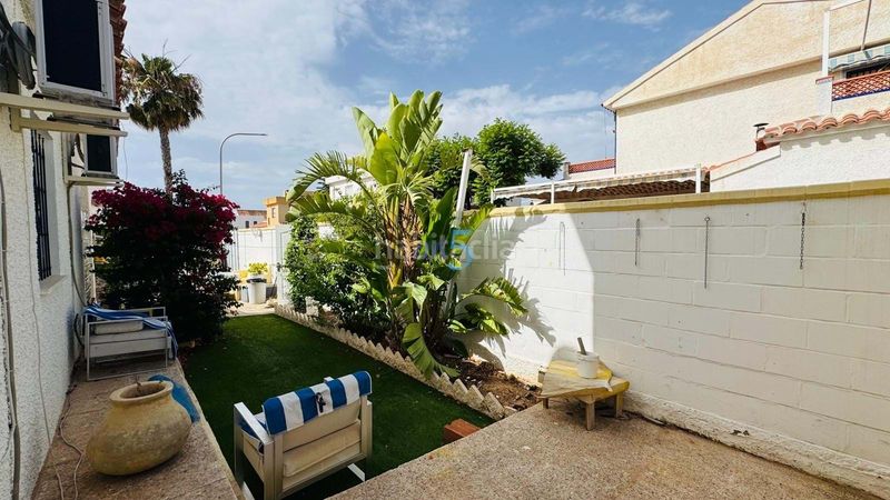 Foto 8c155670-e065-44a1-83b4-4eb2e2ae3ef8. Casa amb piscina a Campoamor Orihuela