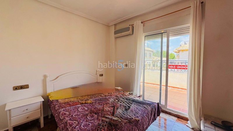 Foto a7c9fa75-e40d-4b0c-bb28-ce79f6bc4950. Reihenhaus mit pool in Villamartín-Las Filipinas Orihuela