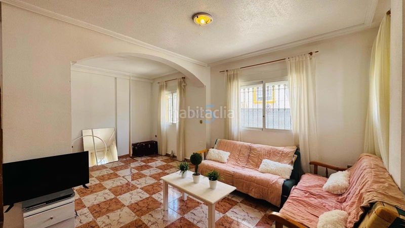 Foto c02db0ce-1292-42d5-87ad-8b6dda6f2a29. Reihenhaus mit pool in Villamartín-Las Filipinas Orihuela