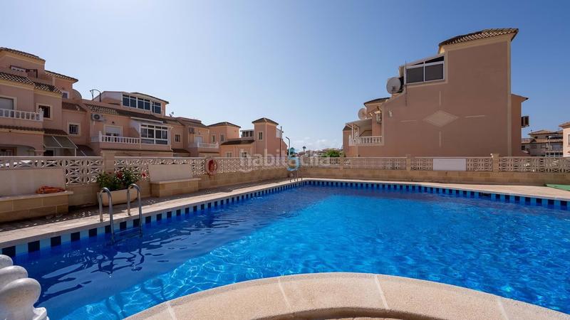 Foto 01c9d4de-ce20-4a93-a028-adfe8fe93214. Casa adossada amb piscina a Playa Flamenca Orihuela